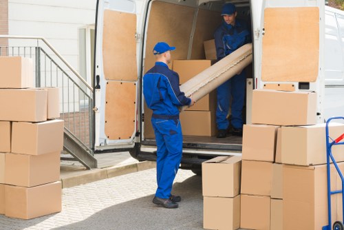 Man with van service loading furniture in Croydon street