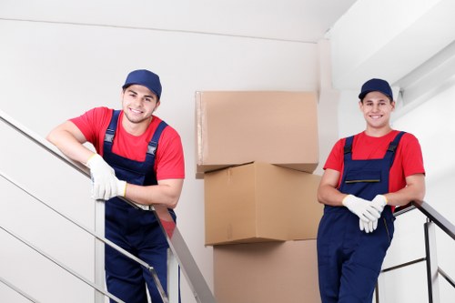 Man and van loading reusable furniture for charity donation