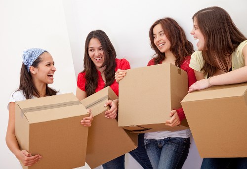 Packed boxes and moving truck ready for a local house move
