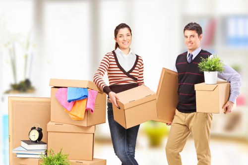 Loading furniture into a local Croydon removal truck
