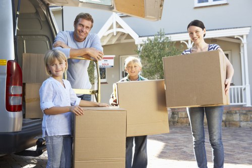 Packing and loading furniture into a removals van