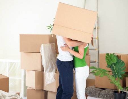 Packed boxes and labelled rooms ready for a house move in Croydon