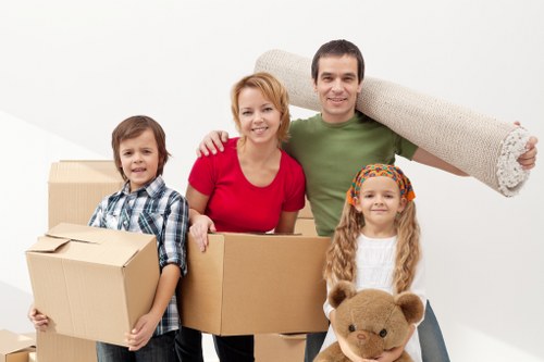 Trained mover handling furniture carefully during a Croydon van move