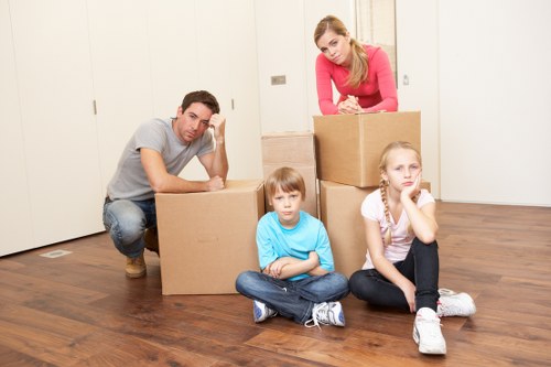 Eco-friendly moving team using reusable packing materials