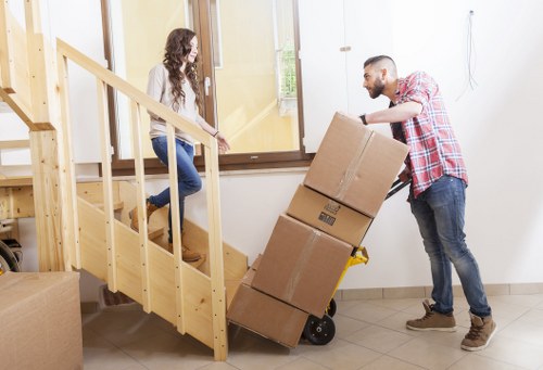 Professional movers handling office furniture during a Croydon commercial relocation